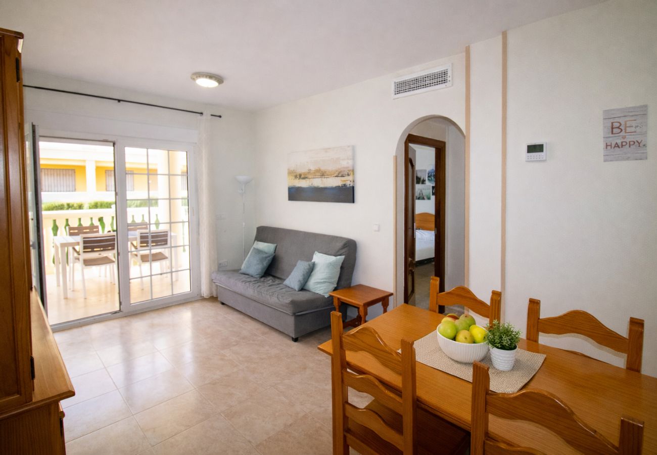 Appartement à Alcocebre / Alcossebre - Bajo con terraza junto a la piscina - Madeira